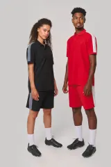Polo de equipo bicolor unisex