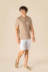 Camisa ecorresponsable efecto lavado de punto jersey manga corta con cuello bowling hombre