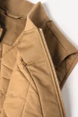 Chaleco acolchado de sarga ecorresponsable con cuello tipo beisbolera unisex