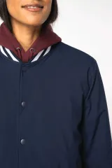 Cazadora tipo beisbolera con relleno unisex ecorresponsable