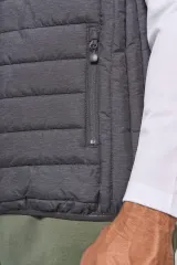Chaleco acolchado con capucha adulto