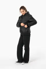 Chaqueta ripstop reciclada con capucha unisex