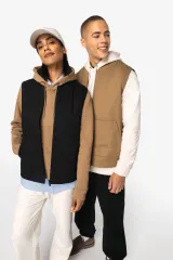 Chaleco acolchado de sarga ecorresponsable con cuello tipo beisbolera unisex