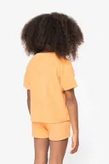 Camiseta ecorresponsable de rizo niña