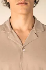 Camisa ecorresponsable efecto lavado de punto jersey manga corta con cuello bowling hombre