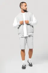 Cazadora de felpa tipo béisbolera unisex