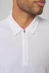 Polo de deporte 1/4 cremallera hombre