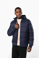 Chaqueta ripstop reciclada con capucha unisex