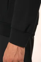 Chaqueta con cremallera y capucha hombre