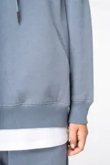 Sudadera ecorresponsable con capucha y mangas raglán mujer