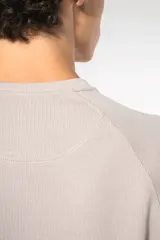 Sudadera algodón orgánico con cuello redondo y mangas raglán de hombre