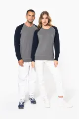 Sudadera bicolor algodón orgánico French Terry cuello redondo mangas raglan hombre