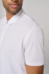 Polo de deporte 1/4 cremallera hombre
