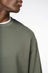 Sudadera ecorresponsable cuello redondo y hombros caídos felpa perchada unisex